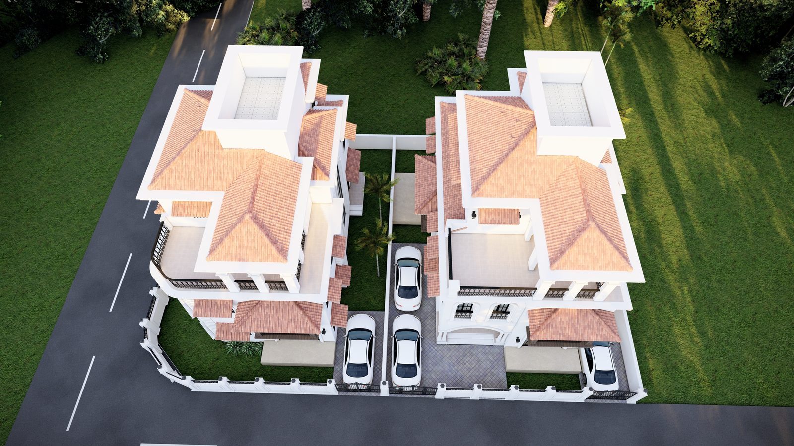 Aerial view of Karma Yugal Villas — full site, both villas, green lawns